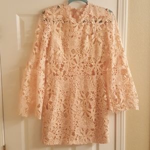 Beautiful open lace dress with bell sleeves